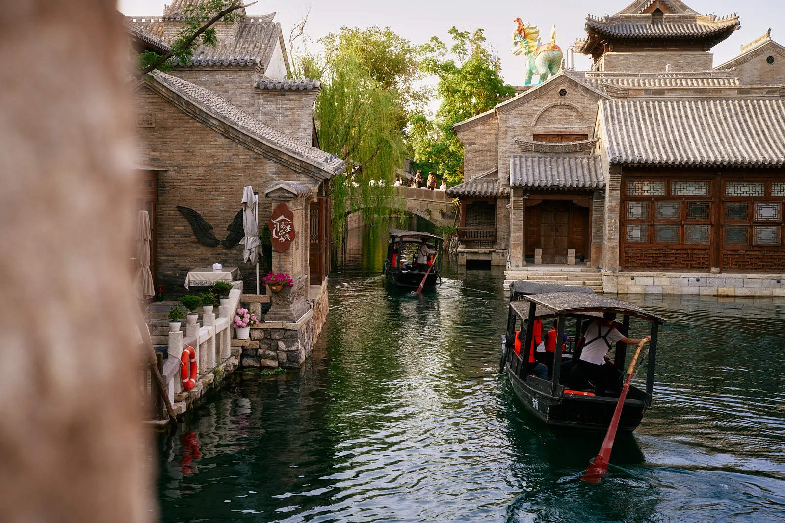 Photo of two traditional chinese boats in a canal