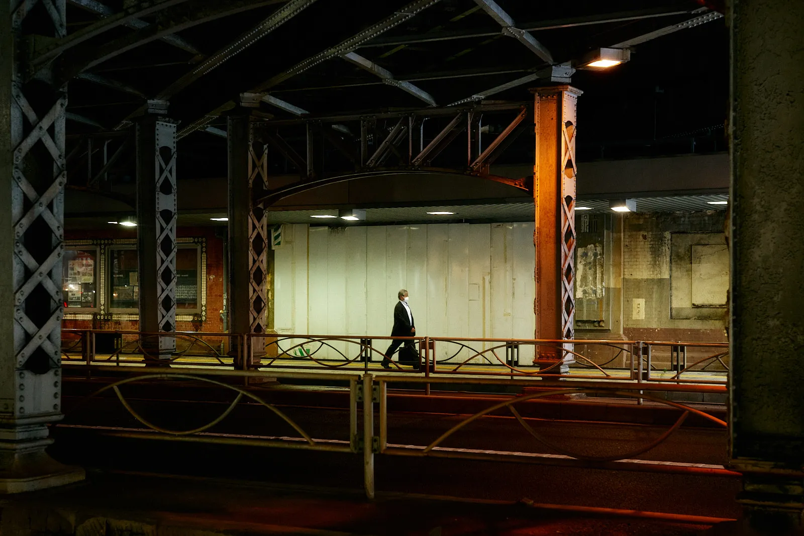 Photo of japanese salary man under bridge in Tokyo Japan